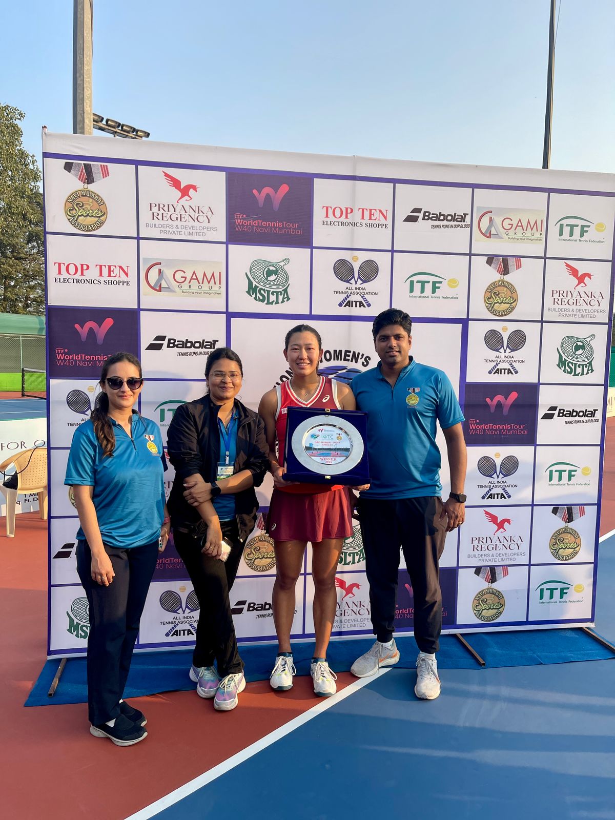 Athlete receiving taping support at tennis championship